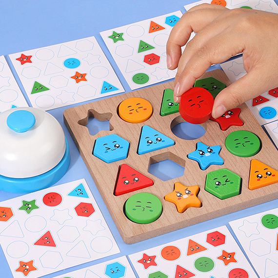 Geometric wooden figures with a bell