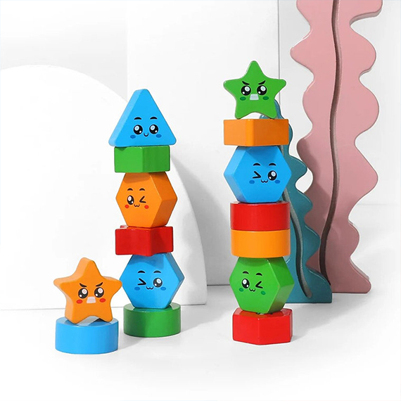 Geometric wooden figures with a bell