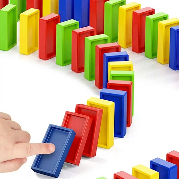 Electric train placing dominoes
