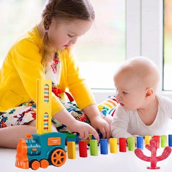 Electric train placing dominoes