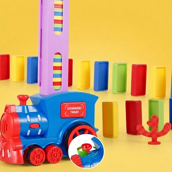 Electric train placing dominoes
