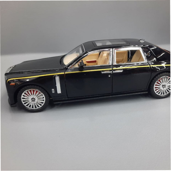 A collectible battery-powered car in 1:32 scale